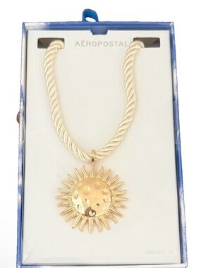 Aeropostale Gold Sunburst Pendant Necklace with Cream Twisted Cord
